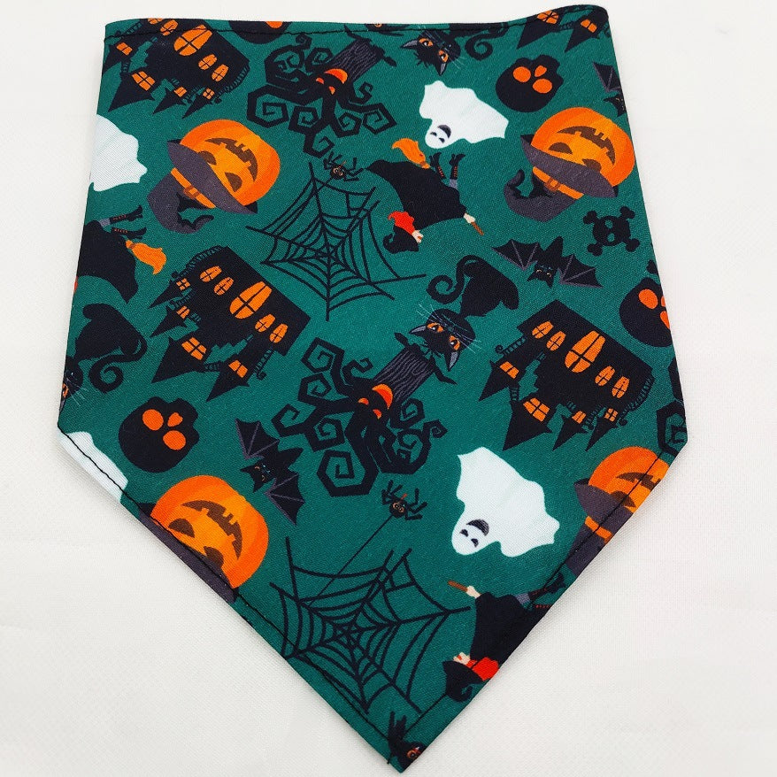 Pet Tie-Dye Triangle Bandana Scarf for Dogs & Cats in green with Halloween-themed icons including pumpkins, ghosts, bats, black cats, spider webs, and haunted houses.