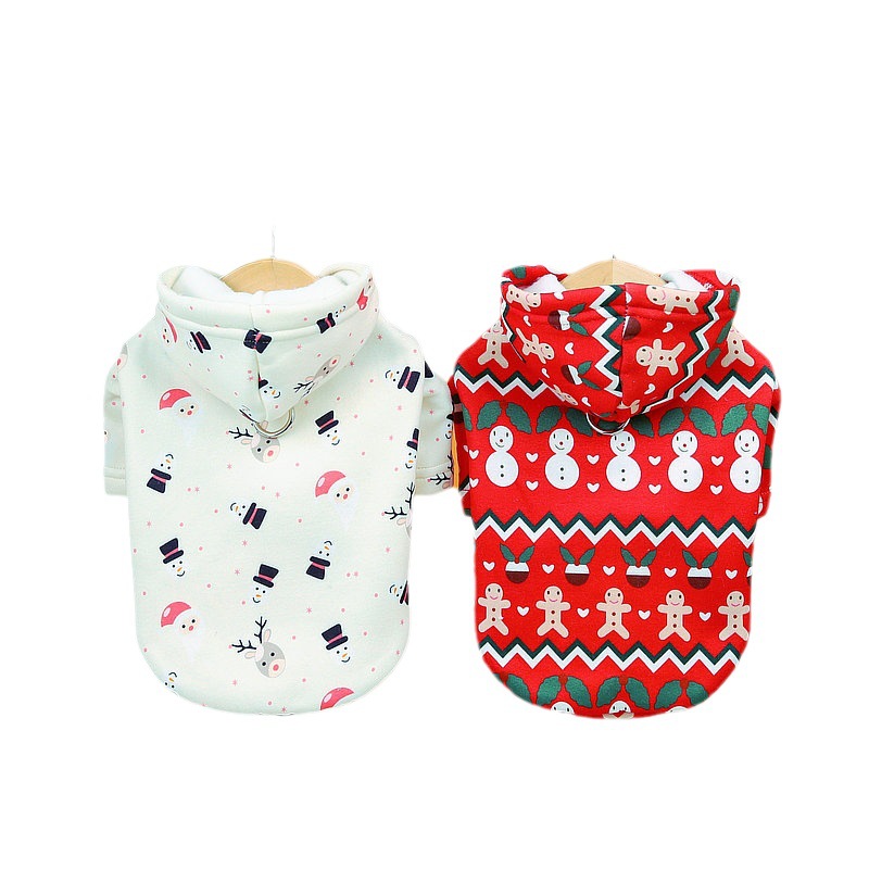 Two festive dog hoodies displayed on hangers featuring Christmas patterns, designed as Dog Christmas Sweatshirt | Festive Holiday Clothes for Dogs for holiday dog apparel and accessories.