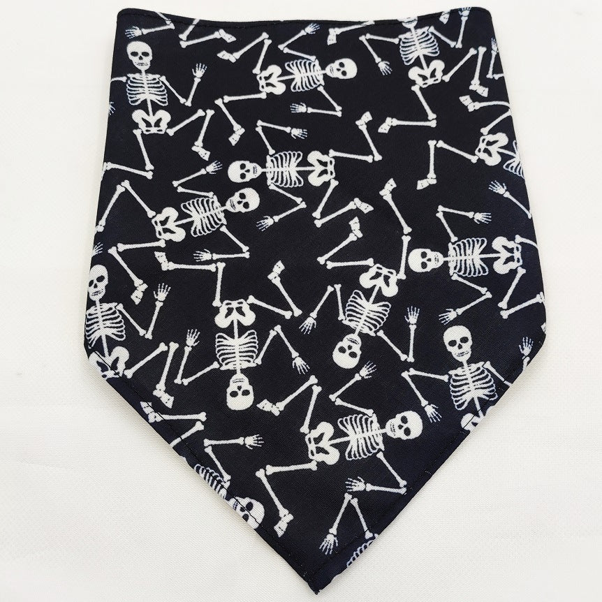 Pet Tie-Dye Triangle Bandana Scarf for Dogs & Cats featuring a black background with white skeleton pattern, designed as stylish dog accessories for seasonal wear.