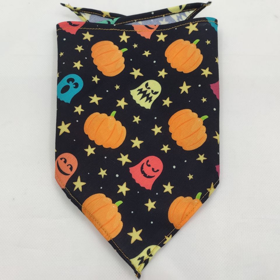 Pet Tie-Dye Triangle Bandana Scarf for Dogs & Cats featuring a festive Halloween design with pumpkins, colorful ghosts, and stars on a black background.