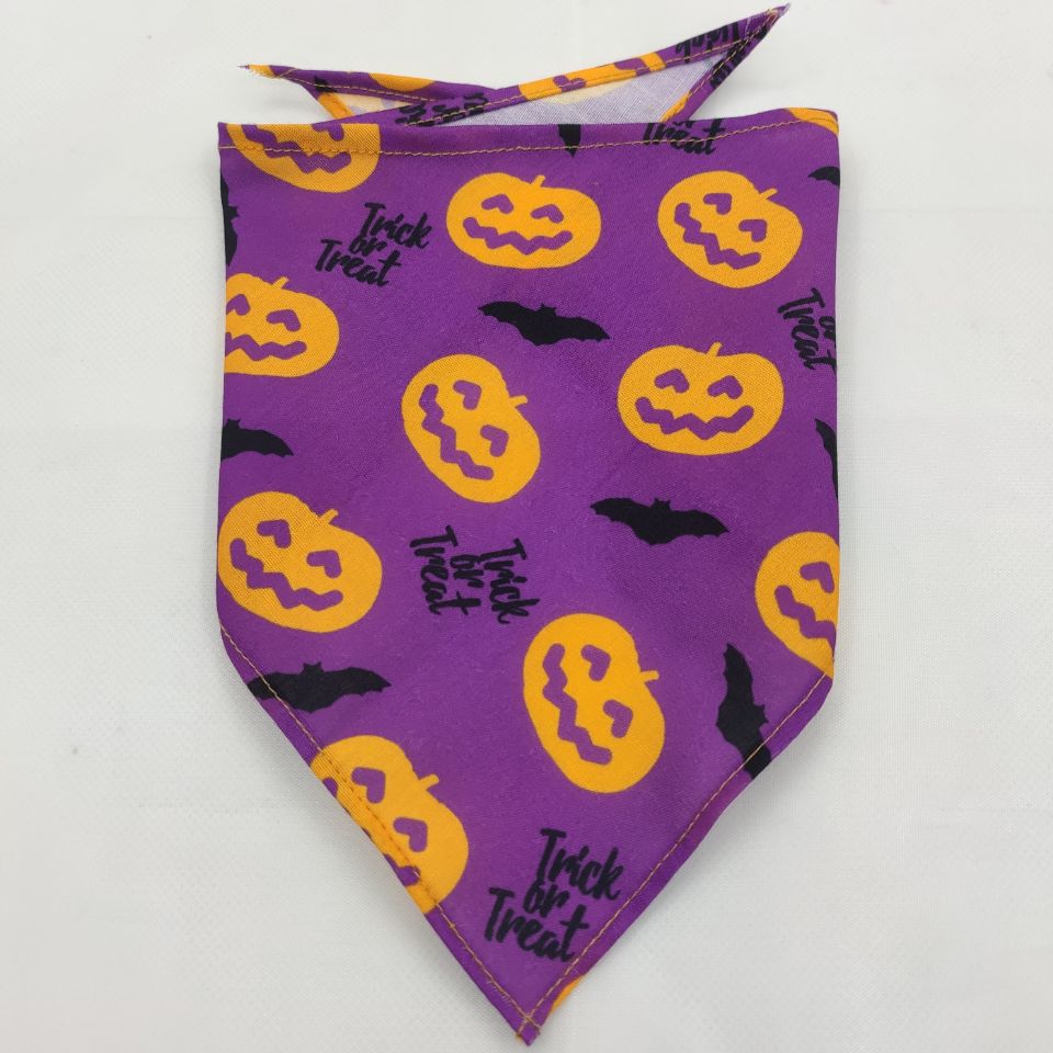 Pet Tie-Dye Triangle Bandana Scarf for Dogs & Cats in purple with orange jack-o'-lantern faces and black bats, featuring "Trick or Treat" text for festive dog accessories.